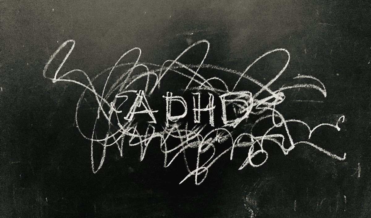 A black board with white writing on it